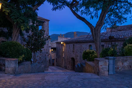 medieval town of pals on the spanish costa brava at nightの写真素材
