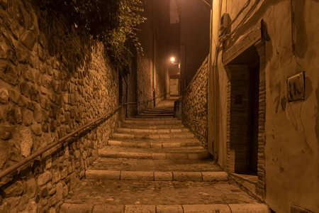alley with stairs in the town of tarazona in zaragoza at nightの写真素材