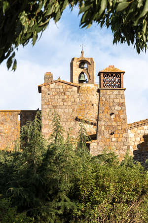 picturesque tower in the medieval village of pals on the costa brava in northern spainの写真素材