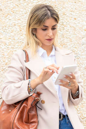 business woman looking at mobile