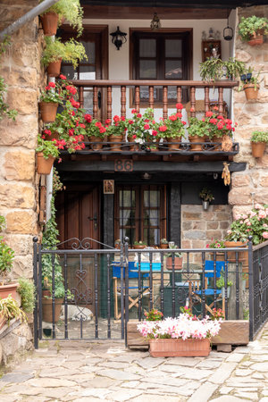 Stone houses and narrow streets in a mountain village in the north of Spain. Barcena Mayor.の写真素材