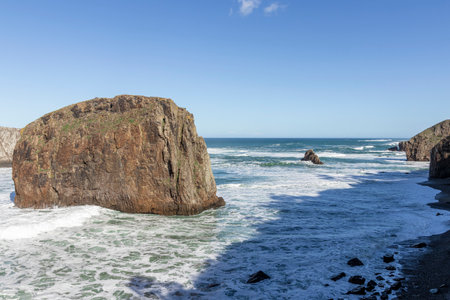Asturian coast, covered in rocks and tourist waters