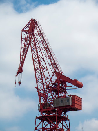 Power and Precision: A Shipyard Crane in Bilbao Showcasing the Art of Heavy Lifting in the Maritime Industryの写真素材