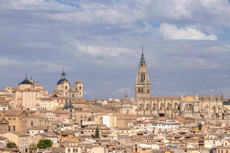 A Captivating Snapshot of the Impressive Historical Heritage of Toledo, Spain, Featuring Iconic Monuments and the Stunning Cathedralの写真素材