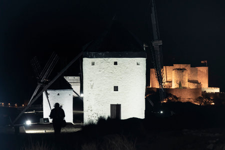 Nighttime Wonders: Scenic View of Toledos Windmills in Consuegraの写真素材
