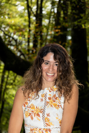 Enchanting Forest Escape: A Radiant Brown-Haired Woman in Rustic Attireの写真素材