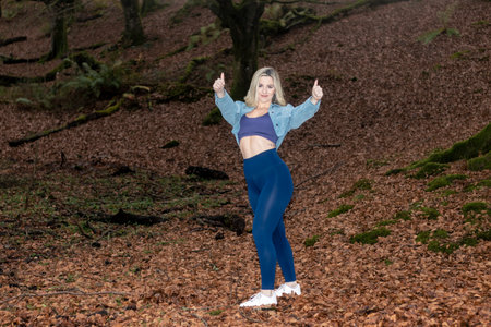 Strength, endurance, and positivity: Athletic woman conquers the outdoorsの写真素材