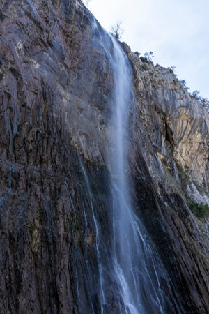 Discovering Nature's Gem: Breathtaking Waterfall at Cantabria's Ason River Birthplaceの写真素材