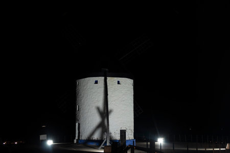 Illuminated Windmills of Consuegra Cast a Spell in Spanish Darknessの写真素材