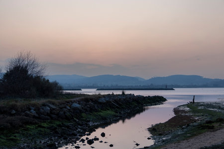Majestic Sunset Over the Ason River: Serene and Breathtaking Northern Spanish Landscapeの写真素材