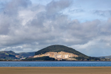 Spectacular Coastal Quarry: Glimpse into the Earth's Geological Treasures at Laredo Estuaryの写真素材