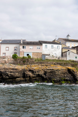 Rinlo's Coastal Wonderland: Scenic Journey through Galicia's Enchanting Maritime Villageの写真素材