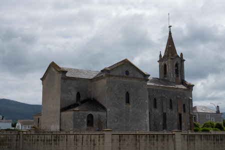 The Graceful Architecture of Rinlo's Historic Catholic Church in Northern Spainの写真素材