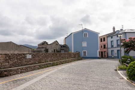 Street in a Quaint European Village with Mountain Viewの写真素材