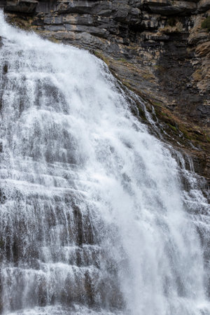 Close up shot of the Cola de Pony waterfall in the Ordesa Valleyの写真素材