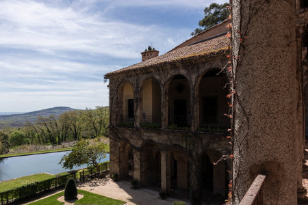 Elegant villa with arches and scenic countryside viewsの写真素材