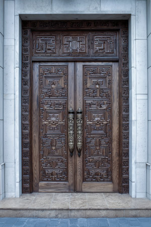 Ornate double door showcasing craftsmanship and adding a touch of elegance to building's facadeの素材