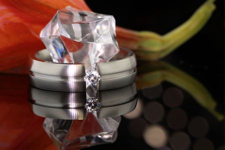 diamond wedding ring reflecting on backgroundの写真素材