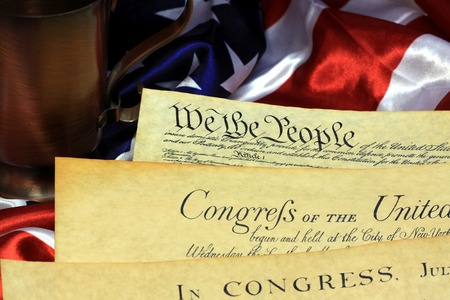 Historical Document US Constitution - We The People with American Flagの写真素材