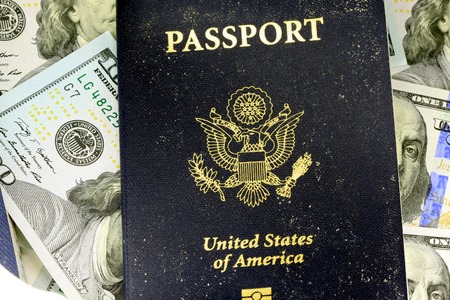 USA Passport with American Currency Travel documents tourism conceptの写真素材