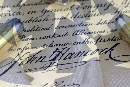 Ammunition on US Constitution John Hancock's signature - The Right to Bear Armsの写真素材