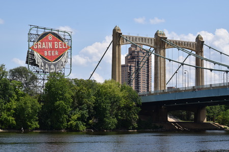 Grain Belt Beer sign and bridge over the Mississippi River.のeditorial素材
