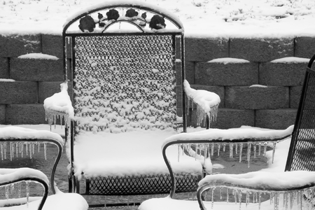 Ice Covered Patio Chairsの写真素材