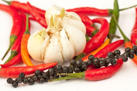 Hot peppers with garlicの写真素材