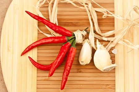 Hot peppers with garlicの写真素材