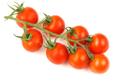 Cherry tomatos over white backgroundの写真素材