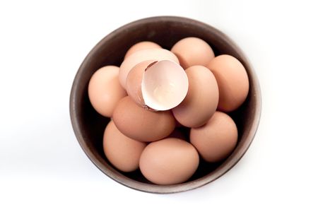 eggs in a ceramic bowlの写真素材