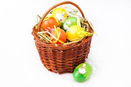 Painted Colorful Easter Eggs in a basketの写真素材
