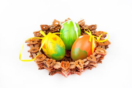 Painted Colorful Easter Eggs in a basket の写真素材