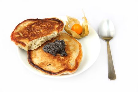 Tow freshly prepared pancakes with poppy souseの写真素材
