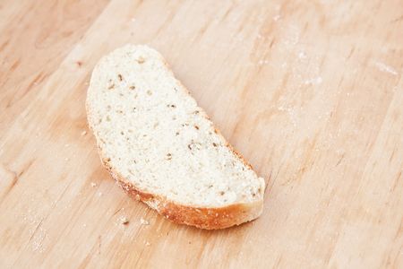 Loaf of bread on wooden deskの写真素材