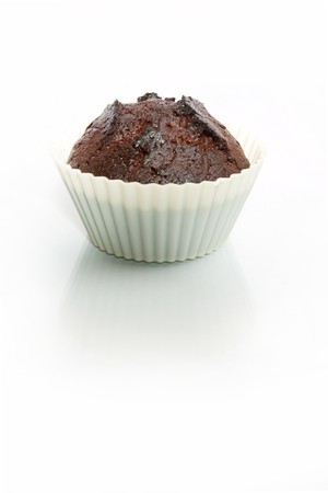 chocolate muffin isolated on white background の写真素材