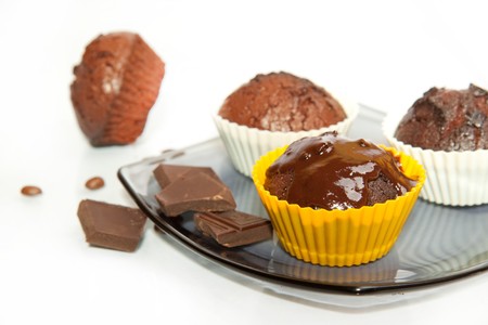 chocolate muffins with coffee beans and chocolate の写真素材