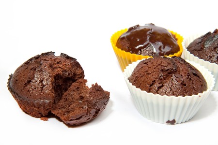 Tasty muffins isolated on white の写真素材