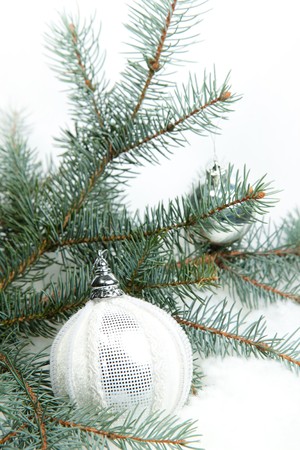 White christmas ball on a christmas treeの写真素材