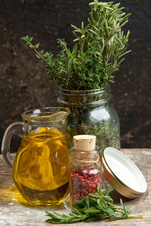 Olive oil with fresh provence herb の写真素材
