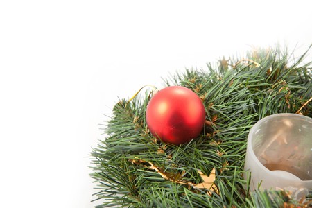 Christmas wreaths with christmas toys on the white backgroundの写真素材
