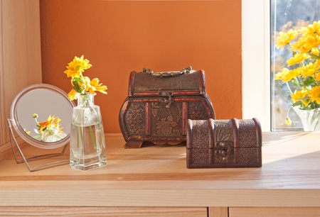 Old style chests and mirror in the interiorの写真素材