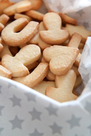 Sugar coated shortbread cookies in the box with starsの写真素材