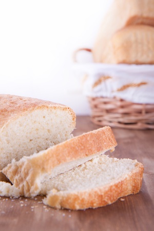 Fresh cooking sliced bread on the wooden tableの写真素材