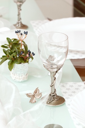 table setting with white and silver colorsの写真素材