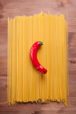 Red hot chili pepper on the italian spaghettiの写真素材