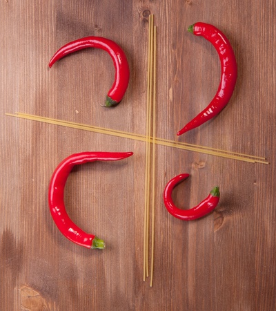 Four section from spaghetti with red hot chilli peppersの写真素材