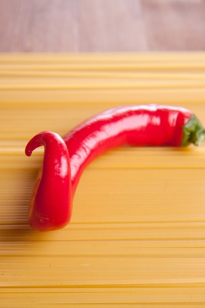 Red hot chili pepper on the italian spaghettiの写真素材