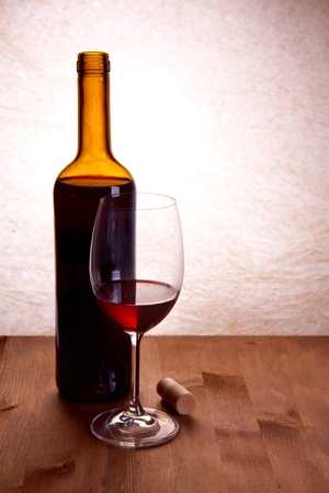 bottle and glass with red wineの写真素材