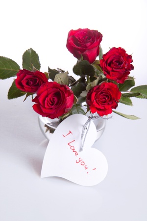 bunch of red roses with white heartの写真素材